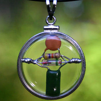 give and wear a beta-blocking circle of peace amulet for world peace and harmony